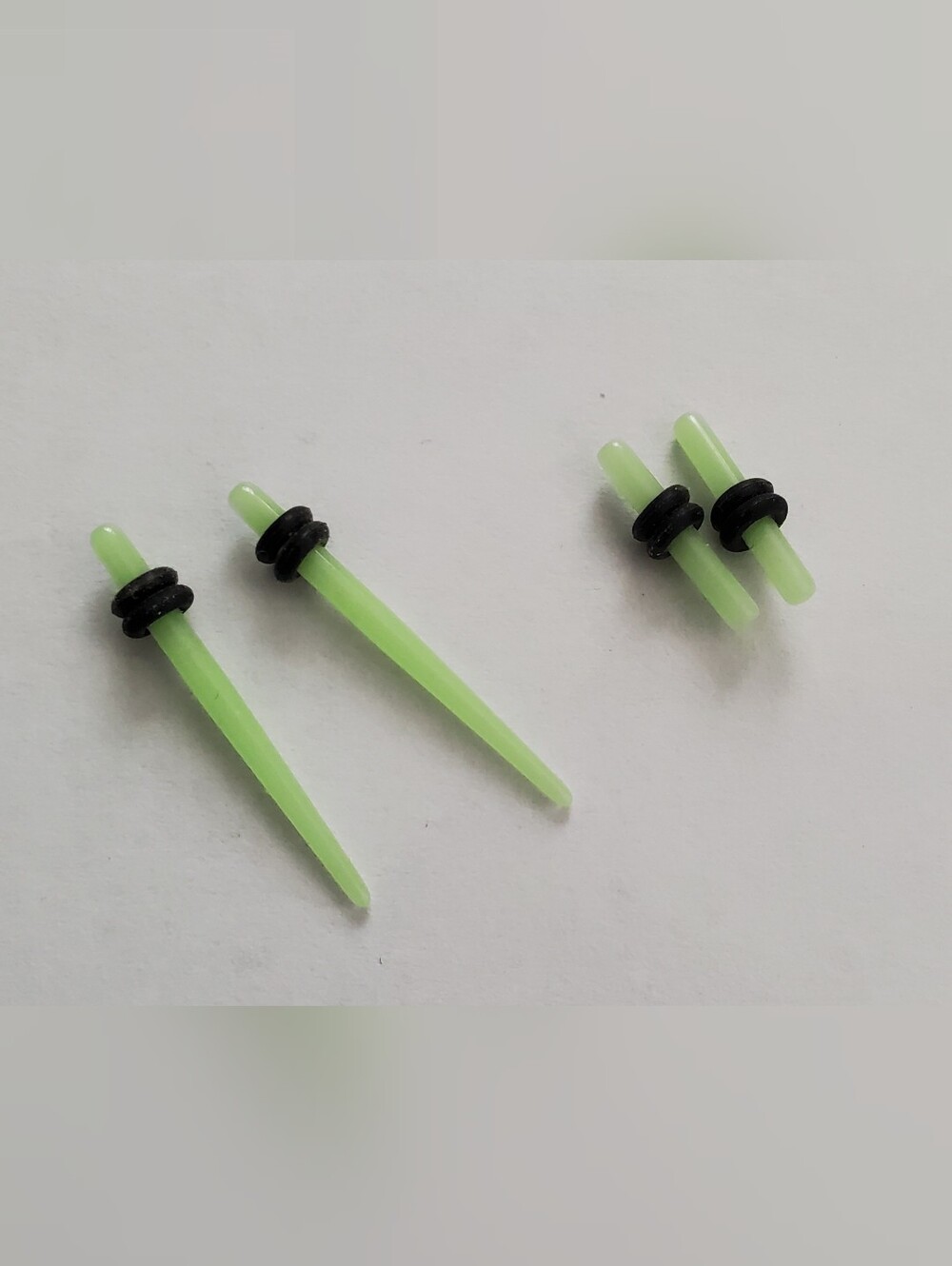 1 Pair Of Glow In The Dark Tapers And Plugs